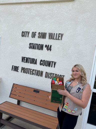 Donating Girl Scout cookies to our local firefighters!